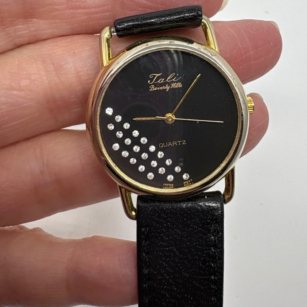 1980s Tali Beverly Hills Watch Rhinestone Accent Gold Tone Black‎ Face Quartz